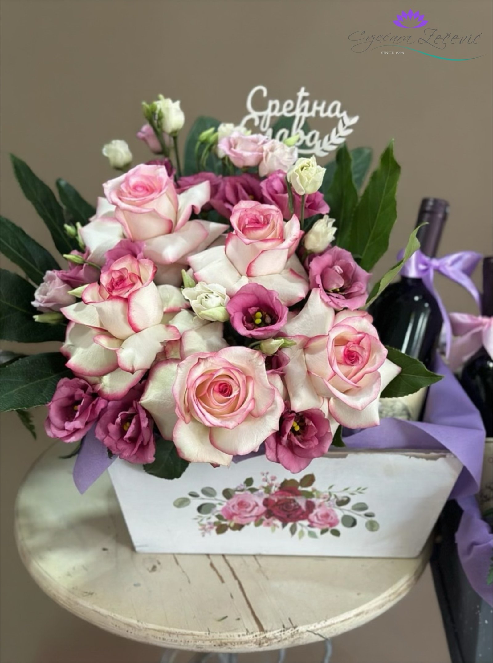  Arrangement with a bottle of wine